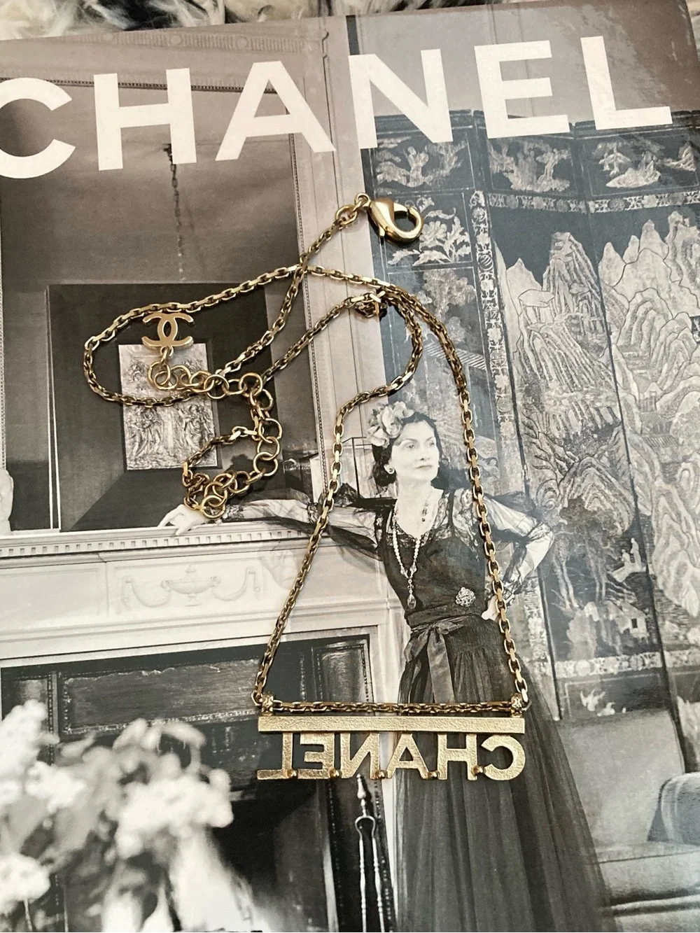 CHANEL Gold and Clear Crystal Logo Necklace